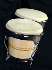 Set of Bongo Drums Isolated on a black Background. Latin percussion.