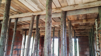 Ceiling support construction with wooden beams