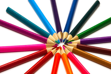 Multi colored pencils circle. White background.