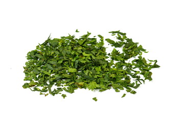 Obraz premium Fresh green chopped parsley leaves isolated on white background and texture, top view. Chopped parsley on a white background isolated. Chopped Parsley Leaves. Fresh Herbs 