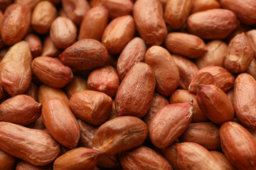 Tasty peanut on whole background, close up. Vitamin food