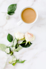 Obraz na płótnie Canvas Coffee cup and. roses