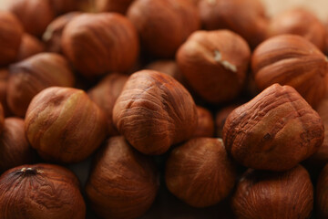 Tasty hazelnuts on whole background, close up. Vitamin food