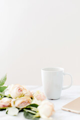 cup of coffee and roses