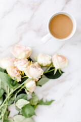 Obraz na płótnie Canvas cup of coffee and rose