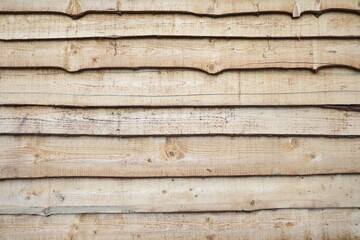 a wall of unpaved boards background.