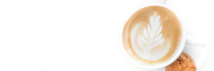 White coffee cup with a single cookie