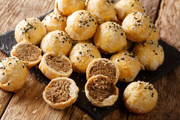 Tau Sar Piah or Tambun Biscuits are baked flaky pastry biscuits filled made from grounded mung...