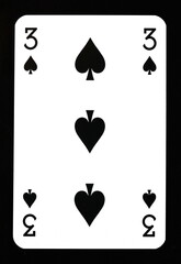 Three of spades playing card isolated on black.