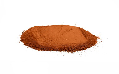 Pile of Red dirt (soil) on white. Heap of Red dry clay isolated on white background. Ochre, also spelled ocher, a natural yellow earth pigment.