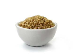 Cooked bulgur wheat isolated on white.