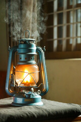 a petromax lamp lighted with fire.