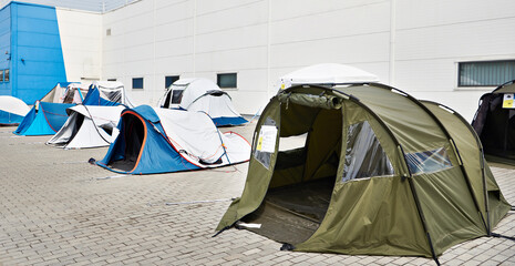 Camping tents at an exhibition near store