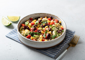 mexican quinoa bowl on a white background, top view