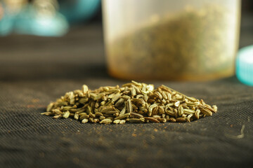 cumin seeds on a table .