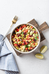 mexican quinoa bowl on a white background, top view