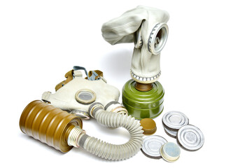 Set of protection chemical gas masks with different filters for them on a white background.