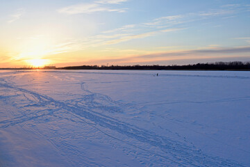 Winter sunset over ice