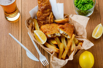 Fast food as a lunch meal. Eating with disposable cutlery