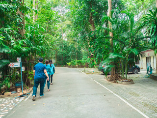 Fototapeta premium Friend female and male travel and tourism trip on holiday vacation mountain green forest environment and selfie after covid-19 corona virus disease.this is new normal solo outdoor activities 