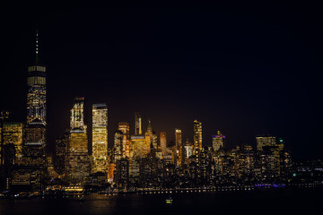 Fototapeta na wymiar Amazing panorama view on New York City skyline and Downtown Manhattan from Jersey City during night.