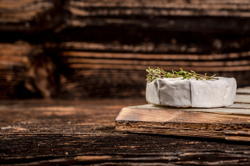 Blue cheese on the old wooden background. free space for text. Healthy Eating