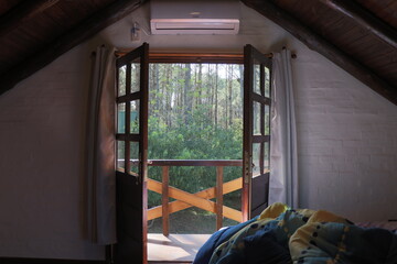 Chalet room overlooking the pine grove