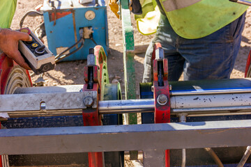 Polyethylene welder preparation for welding to pipes with polyethylene pipe welding machine.