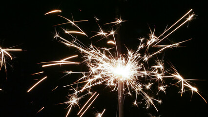 Celebrating Independence Day with sparklers, a 4th of July favorite.