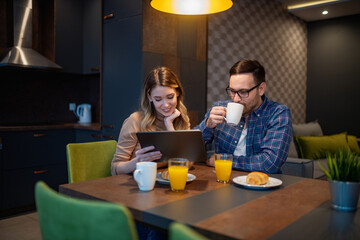Young couple in the morning at home.