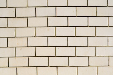 beautiful brickwork of silicate brick in the design of the facade of the building, closeup shot