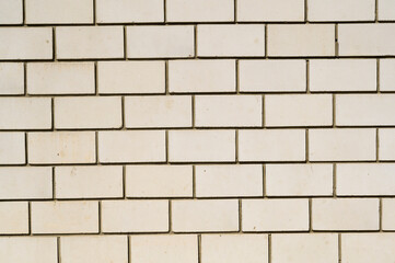Naklejka premium beautiful brickwork of silicate brick in the design of the facade of the building, closeup shot
