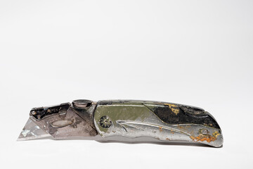 Carpenter's utility knife isolated on a white background with room for copy at the top