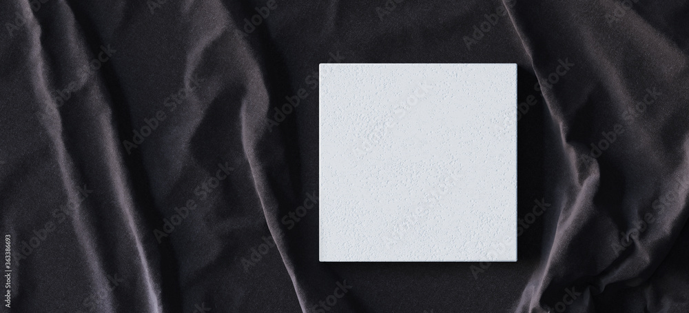 Poster minimal background for branding and product presentation. white stone podium on black fabric backgro