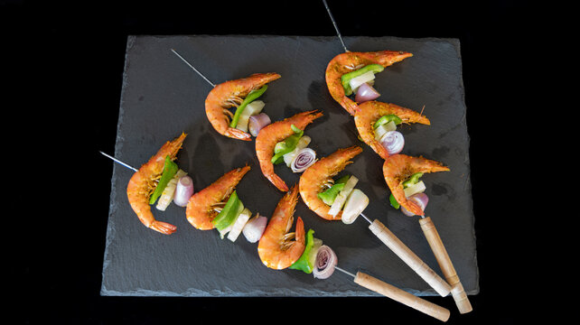 
Trio Of Delicious Shrimp Skewers, On A Slate