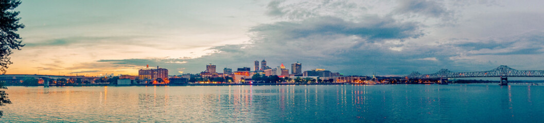 sunset on the river city skyline