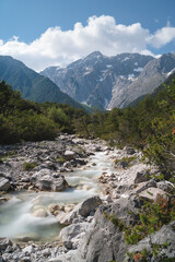 Clear fresh mountain river in the alpine landscape and rocky tops, Mieming, Tirol, Austria