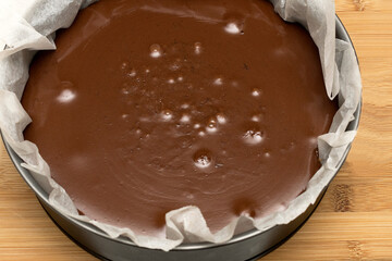 Mix of a chocolate cake prepared to put the meringue