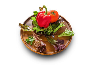 Vegetables on wooden plate