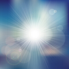 abstract blue background with rays of sun in the sky
