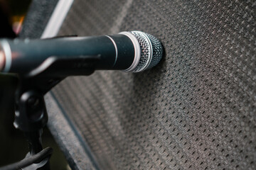 Microphone near the speaker. Concert musical equipment.