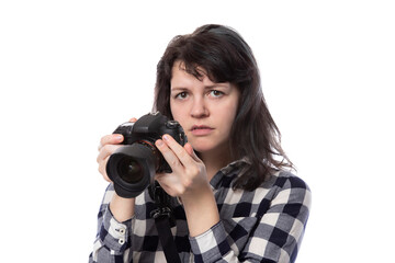 Young female freelance professional photographer or art student or photojournalist on a white...