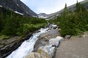 Fototapeta na wymiar Waterfall along the Going to the Sun Road at Glacier National Park, Montana