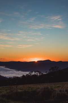 sunrise sky with beautiful clouds rolling over the hills of Tasmania