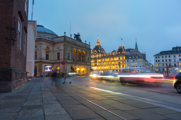View of King's New Square at dusk with trail of car light in Copenhagen, Denmark