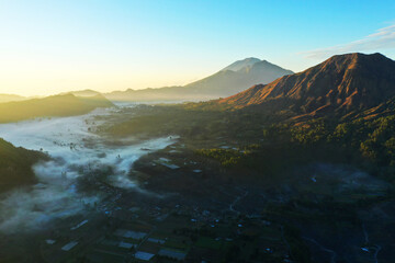 sunrise over the mountains, beautiful view from Pinggan Village, Kintamani, Bali.