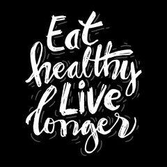 Eat healthy live longer hand written lettering.  Healthy lifestyle.