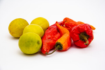 red and yellow peppers  lemon  red chili  red spray 
red hot chili sprayed spray