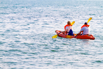 Traveler play small boat at beach