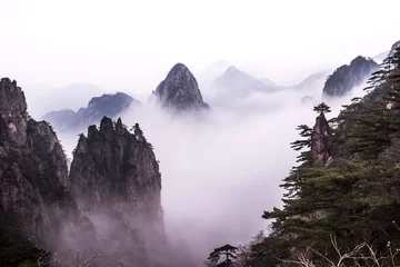 Vlies Fototapete Huang Shan Wonderful and curious sea of clouds and beautiful Huangshan mountain landscape in China.